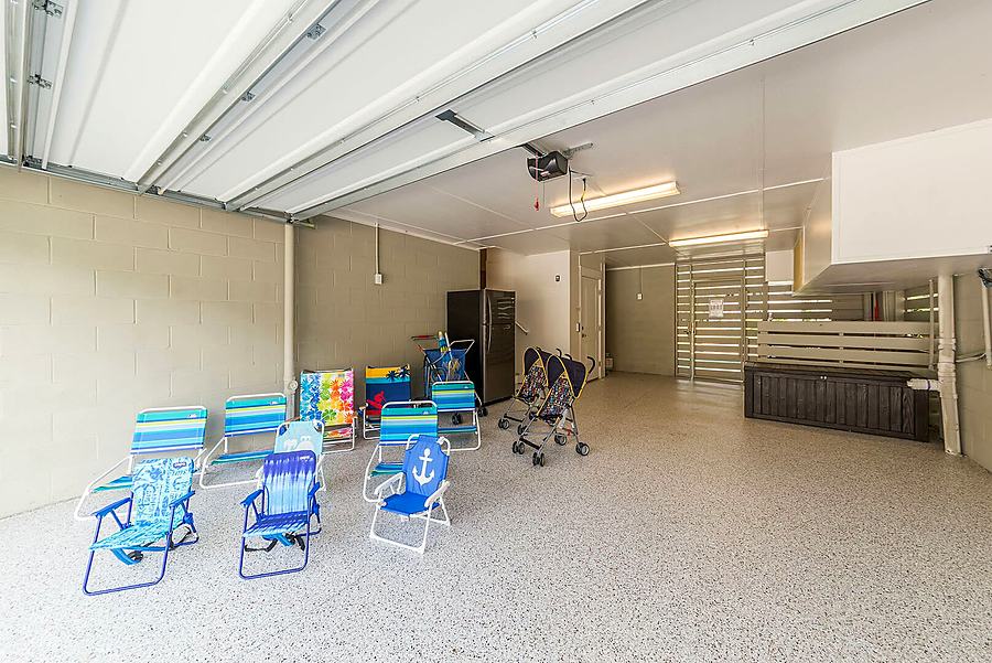 Garage with beach chairs, wagon and stroller