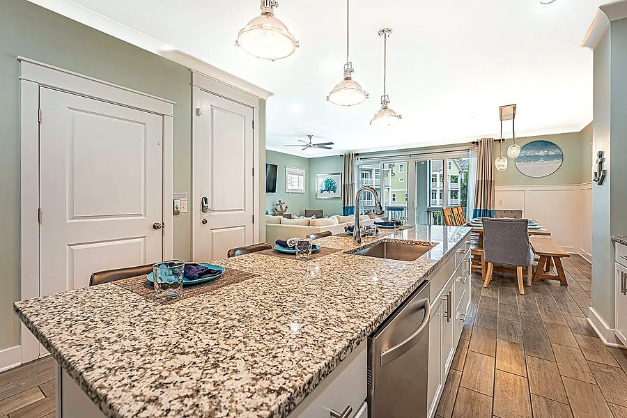 Kitchen granite island looking into the dining room