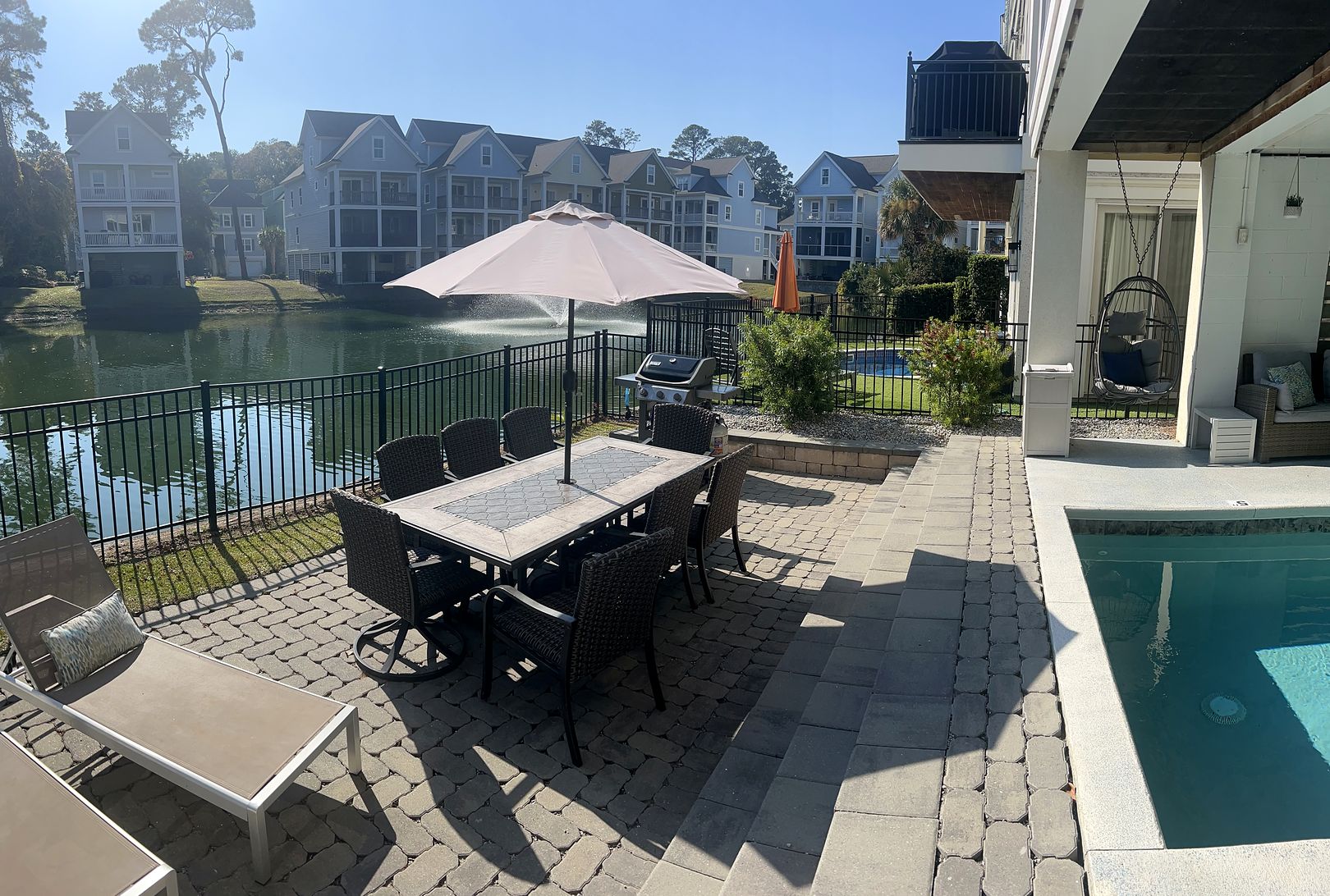 Pool, patio and lagoon at 122 Sandcastle Court, Hilton Head Island
