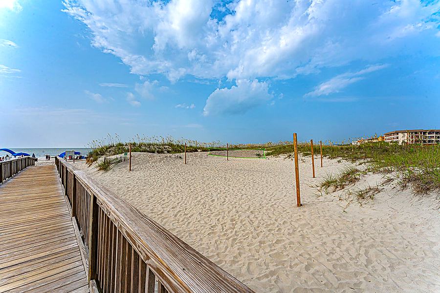 Boardwalk crossing the dunes at Folly Field